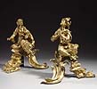 A magnificent pair of Louis XV Chinoiserie gilt bronze chenets